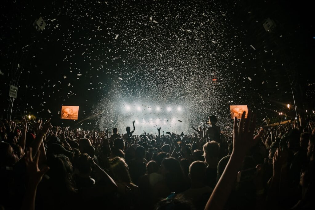 Concert crowd under stage lights, used as an illustrative image for the 2026 SPOTV K-POP AWARDS