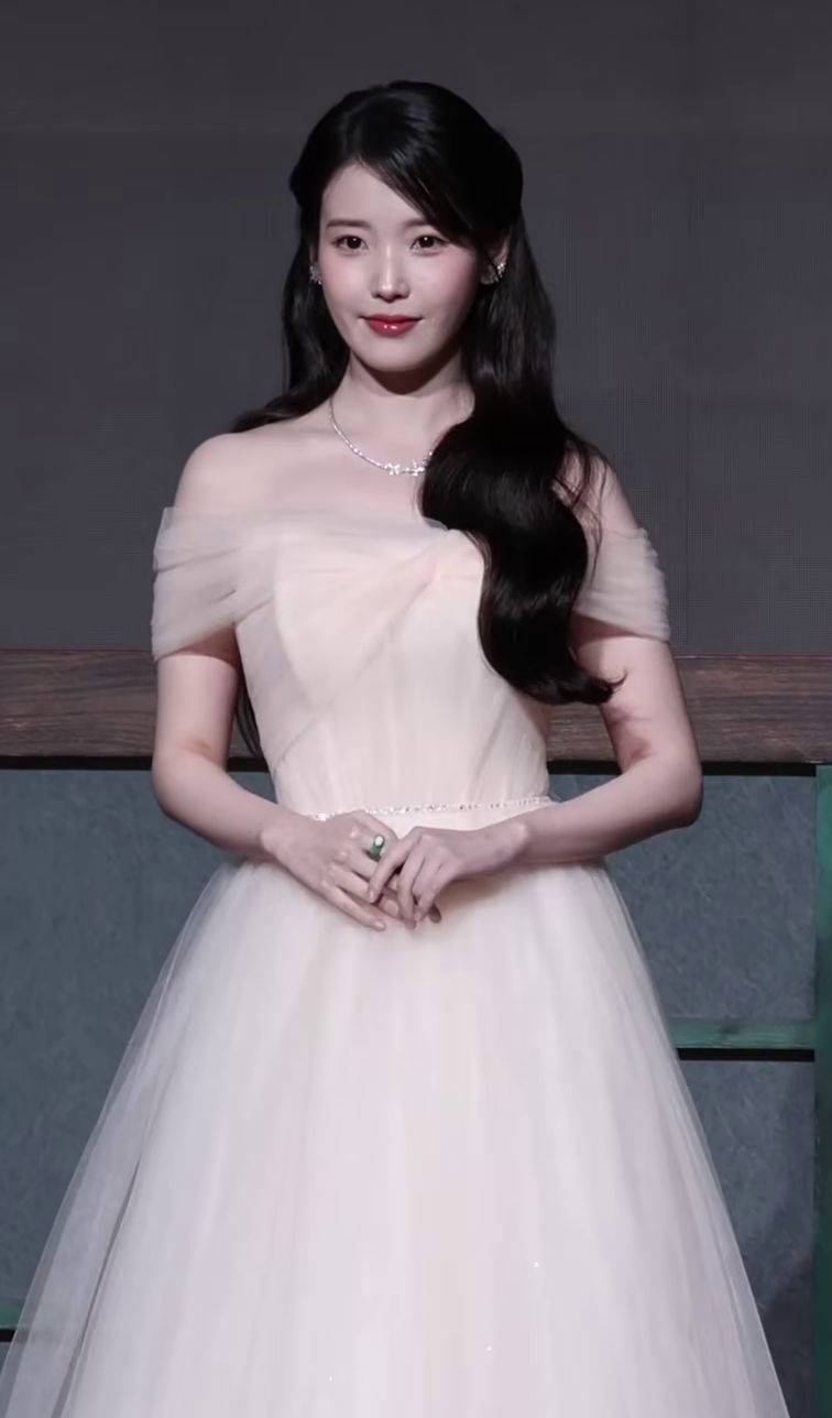 IU Unknown Planet, IU in a pale dress at the Perfect Crown press conference on April 6, 2026