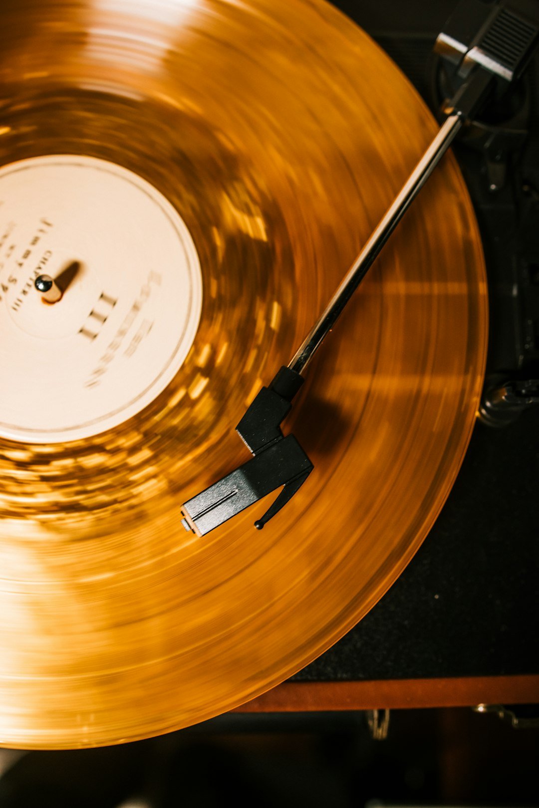 Vinyl record spinning on a turntable, illustrating the K-pop LP market