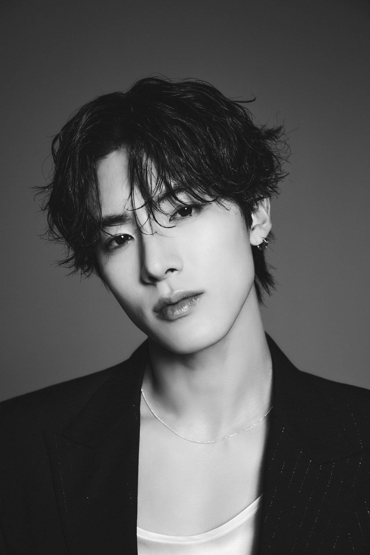 ERIC of THE BOYZ in an official ONE HUNDRED portrait