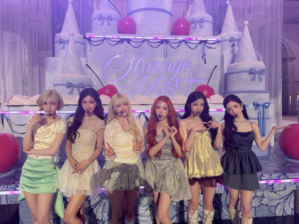NMIXX six members pose together at MBC Show! Music Core during their October 24, 2026 Birthday Wish promotions. Photo: NMIXX official X account.